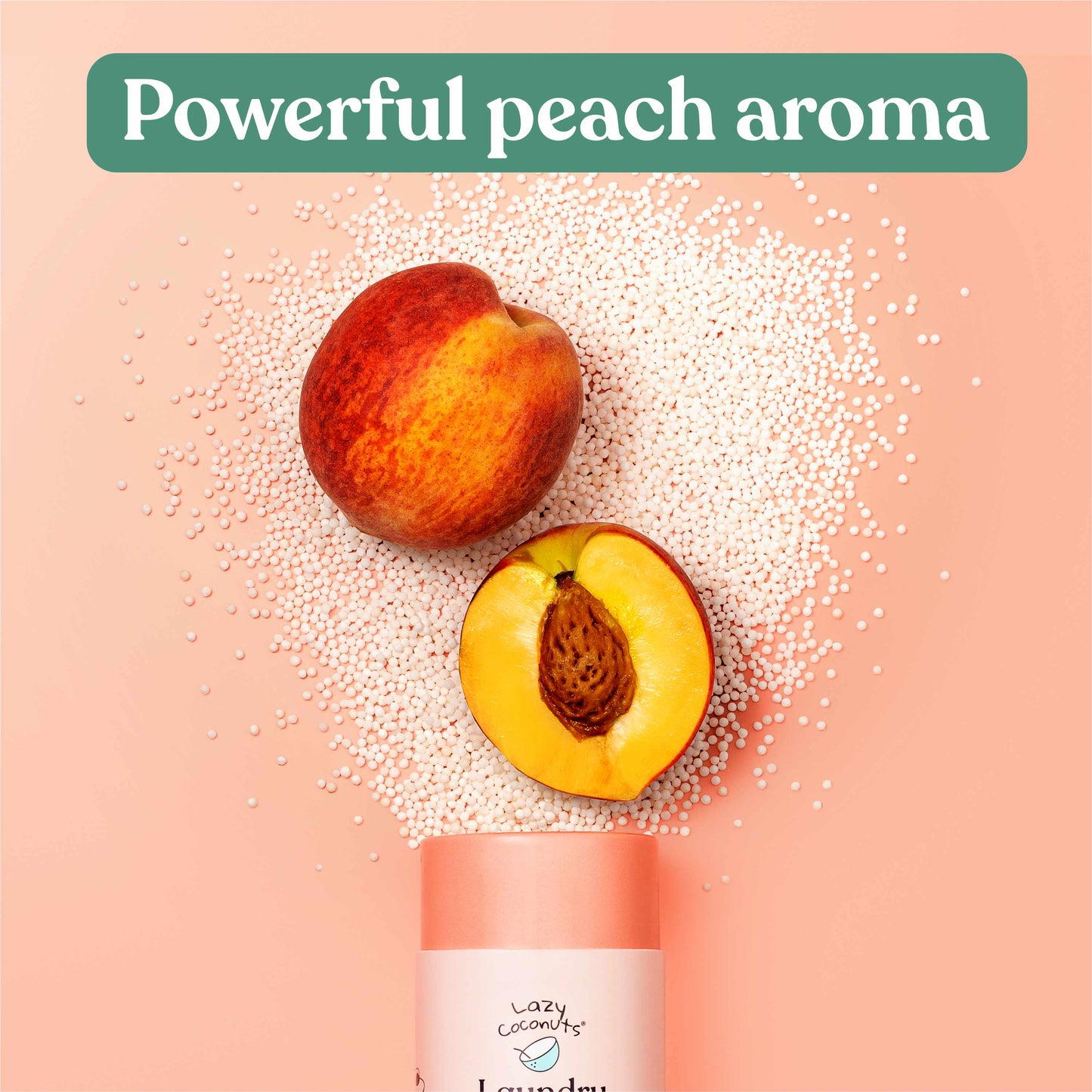 A peach fragrance booster tube shown with whole and halved peaches and scattered white granules on a soft peach background, with the text 'Powerful peach aroma' at the top.