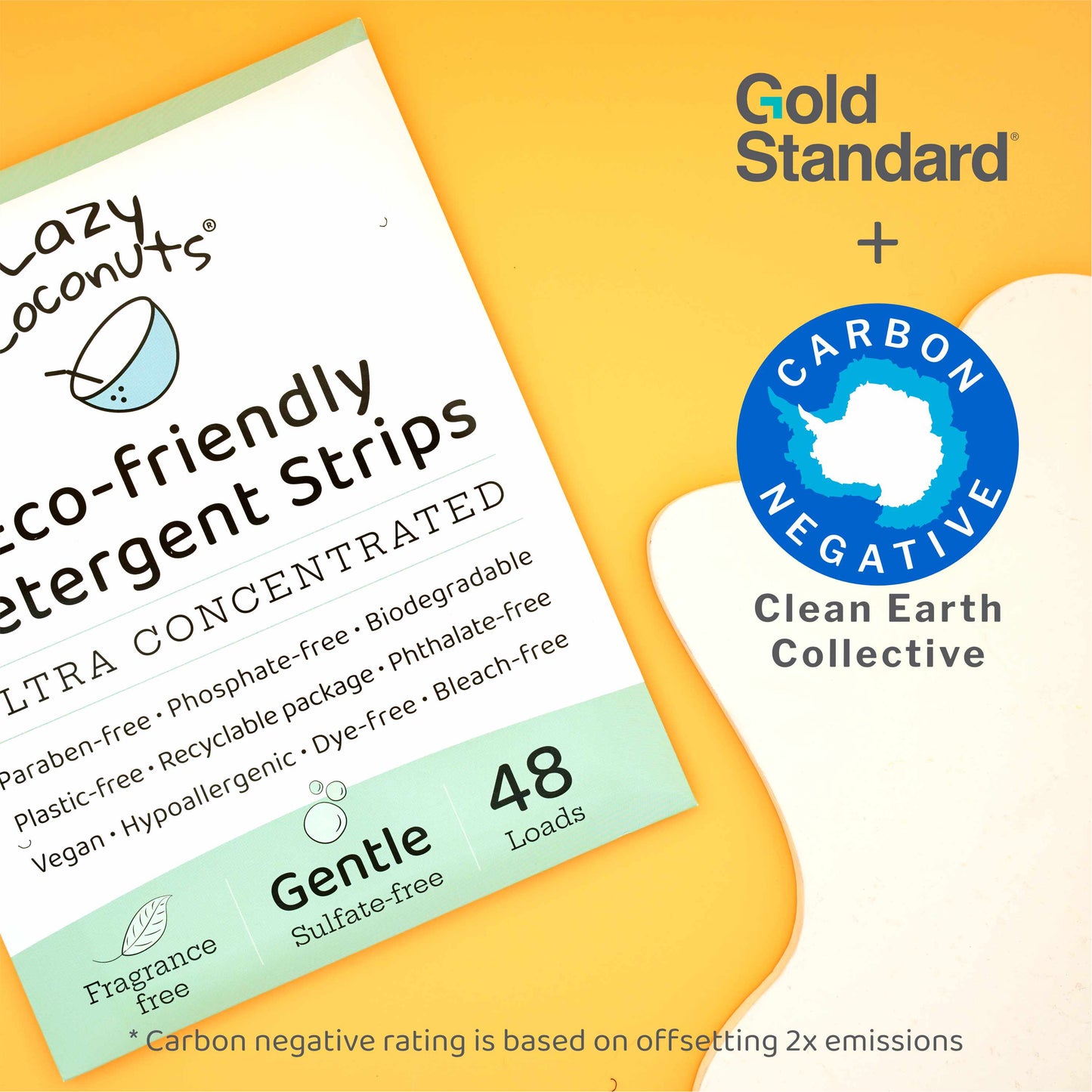Lazy Coconuts eco-friendly detergent strips packaging shown at an angle on a yellow and cream background, alongside a Gold Standard + Carbon Negative Clean Earth Collective certification badge.