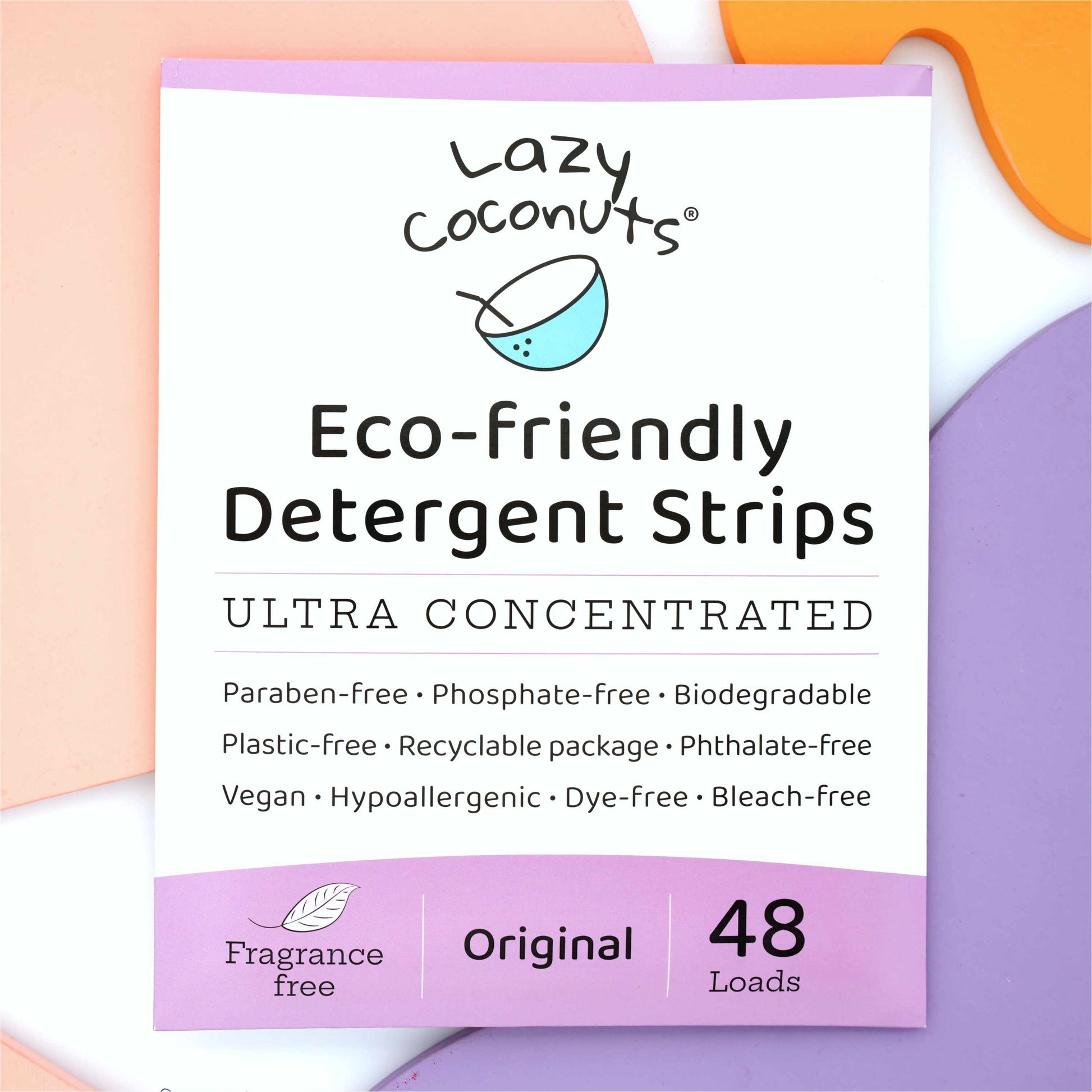Lazy Coconuts Eco-friendly Detergent Strips Ultra Concentrated package, featuring a white box with lavender and purple accents, set against a pastel multicolor background.